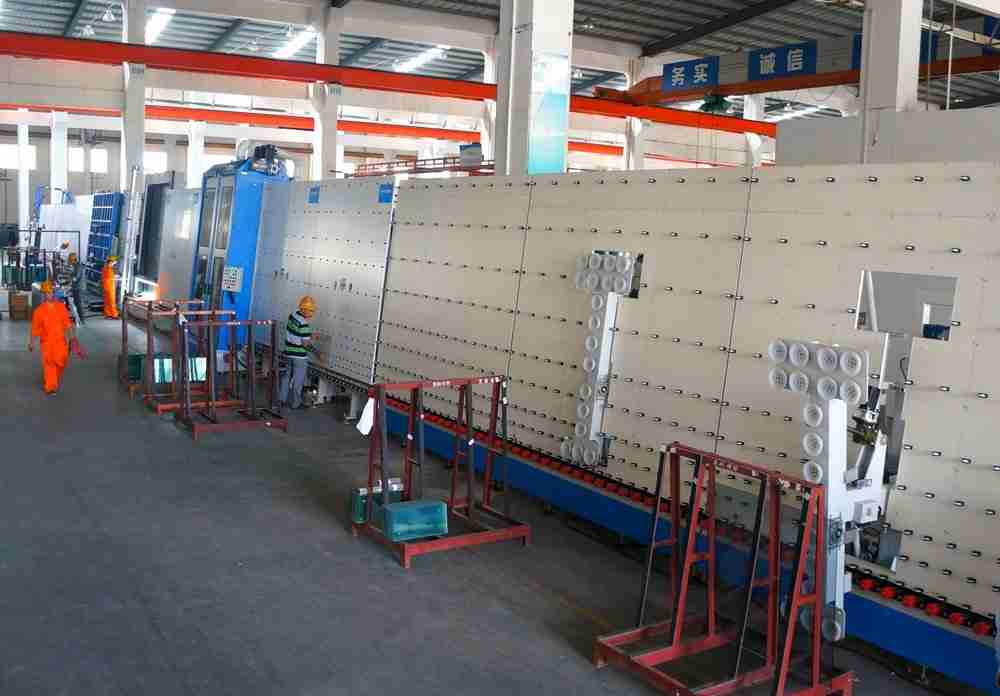 Shenzhen Dragon Glass auto gas filled Bystronic insulating line for argon gas filled windows production.