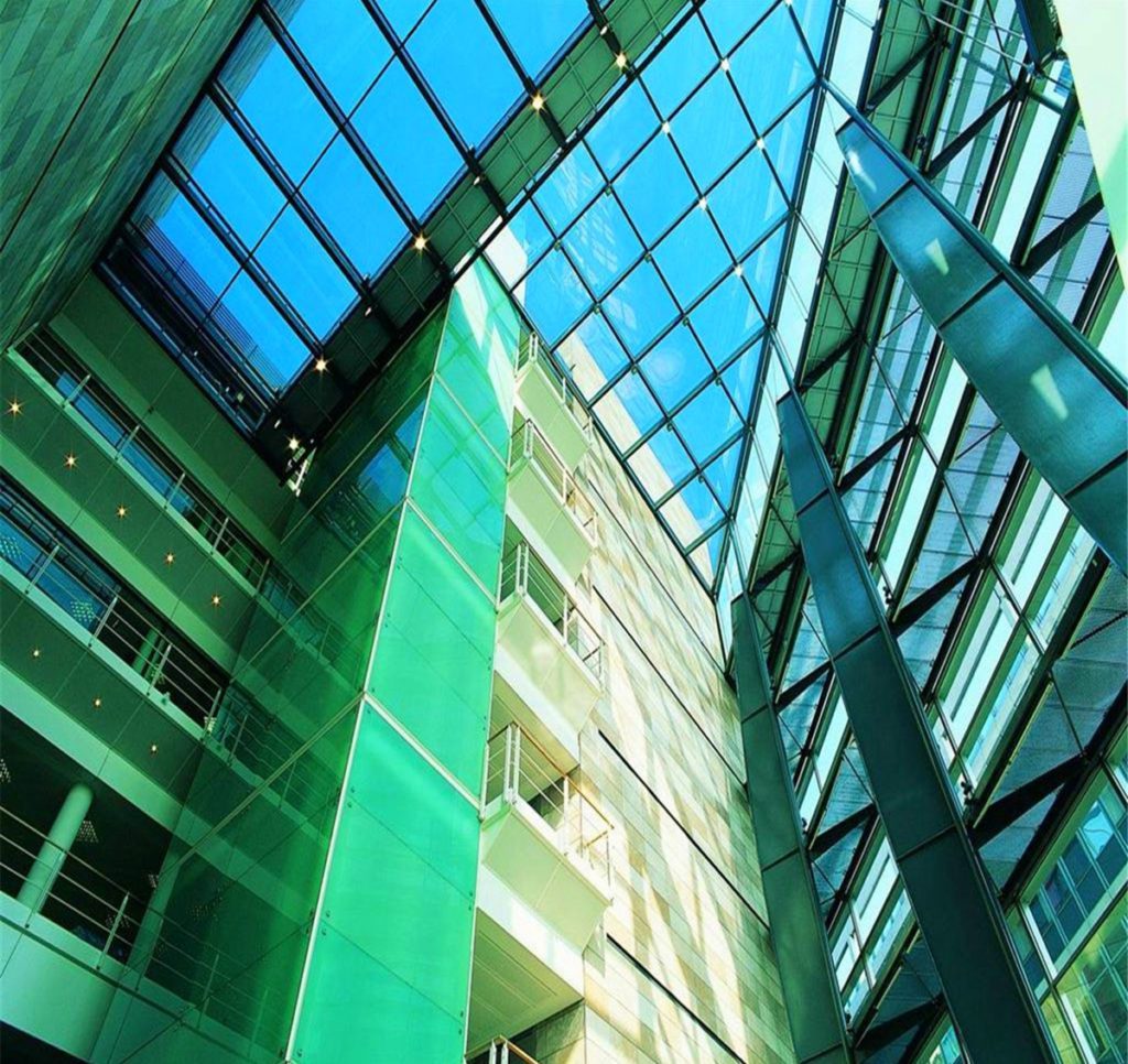 Economical energy-saving 8mm green reflective glass window manufacturers，Shenzhen Dragon Glass